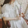 S26bdf45766dd4c168e51aa209c5de1bf1.webp Vintage Victorian Cotton Lace Nightgown – White V-Neck Short Sleeve Sleep Dress