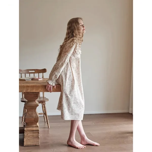 S078c6fc8f04c49cfa4e3940382963a66D.webp Back view of vintage pink floral nightgown with gathered sleeves