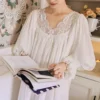 Vintage white cotton lace nightgown with flowing ankle-length skirt
