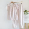 Vintage floral cotton pajama set in pink with long sleeves and trousers