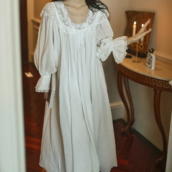 Full-length white jacquard cotton nightgown with lace neckline and cuffs