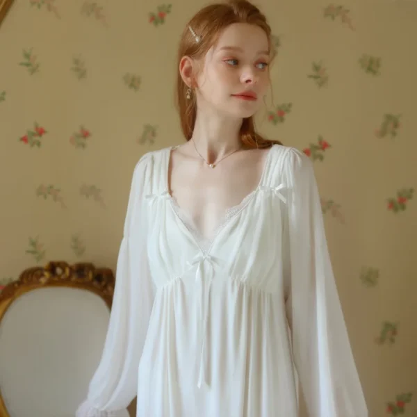 Victorian Lace Nightgown – V-Neck Detail V-neck lace detail on the Victorian white cotton nightgown